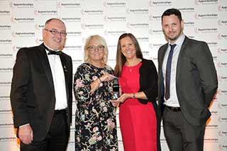 Jo Wyke and Brand Manager Elliot Allison collecting the award